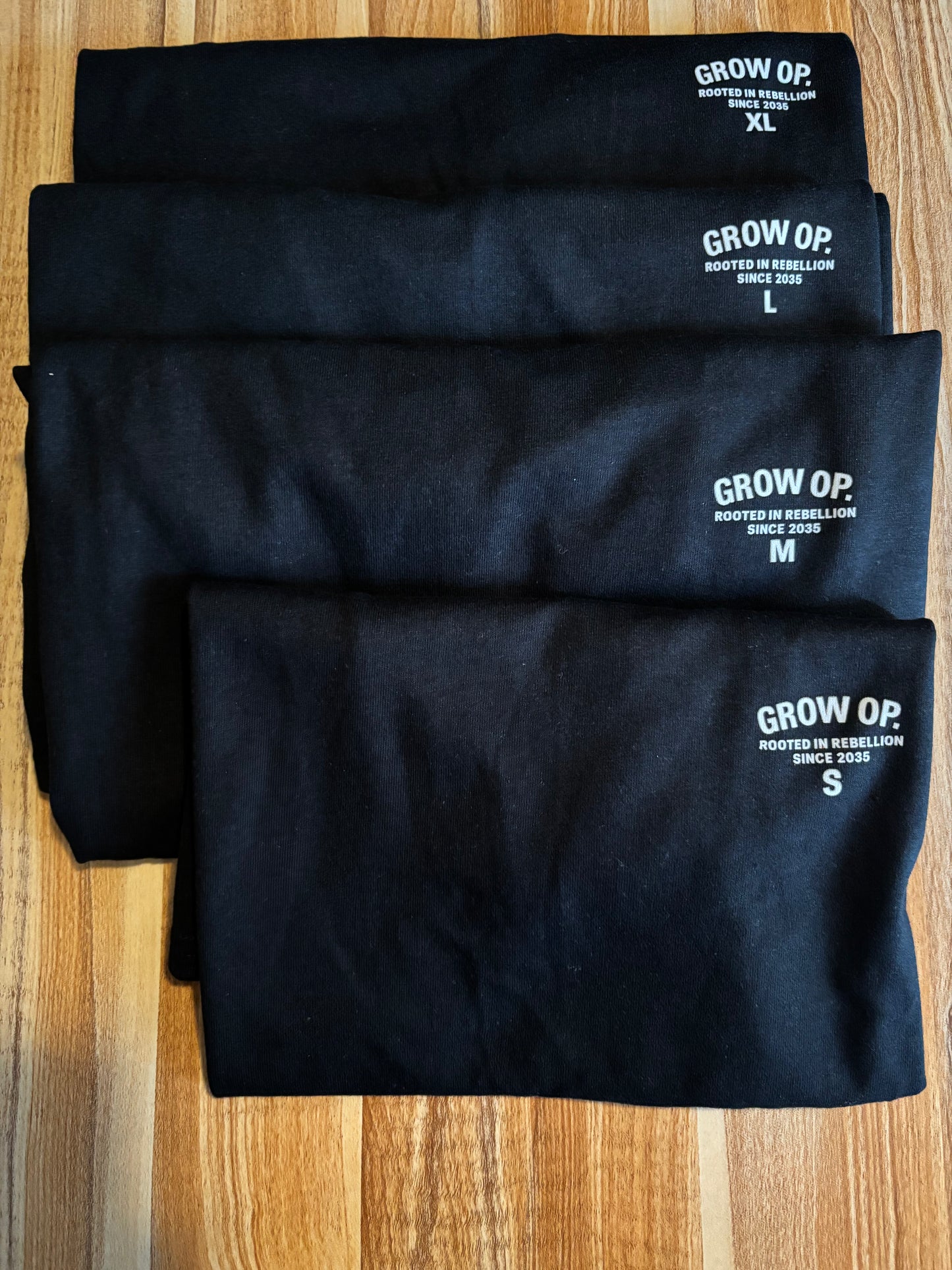 GROW OP. “ROOTED IN REBELLION” ESSENTIAL TEE